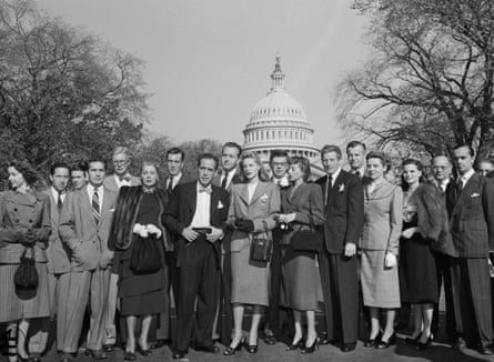 In 1947, a black and white image of Hollywood celebrities arriving at the Capitol to protest at the tactics of the House UnAmerican Activities Committee’s Investigation into alleged Hollywood Communism. In the center of the group are Richard Conte, June Havoc, John Huston, Humphrey Bogart, Paul Henreid, Lauren Bacall, Joe Sigtrom, Evelyn Keyes, Danny Kaye, and John Shepherd