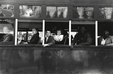 Black and white image of segregated passengers on a trolley car in New Orleans, US, 1955