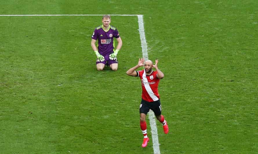 Nathan Redmond celebrates after beating Aaron Ramsdale for Southampton's third goal.