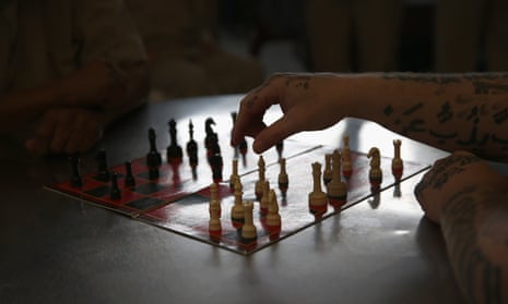 Inmates play chess at a prison in the US