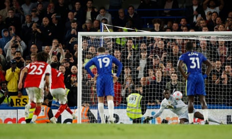 Arsenal’s Bukayo Saka scores their fourth goal from the penalty spot.