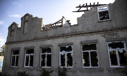 A view of a destroyed house in village of Shevchenkove.