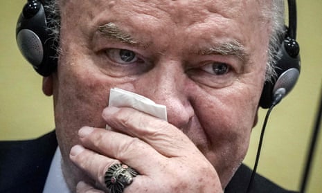Ratko Mladic wipes his face