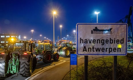 Farmers and their tractors gather for a protest action near quai 730 in the port of Antwerp.