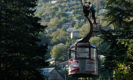 Malkhaz Kapanadze, 36, oils and checks a cable car during maintenance work in the town of Chiatura, some 220 km (136 miles) northwest of Tbilisi.
