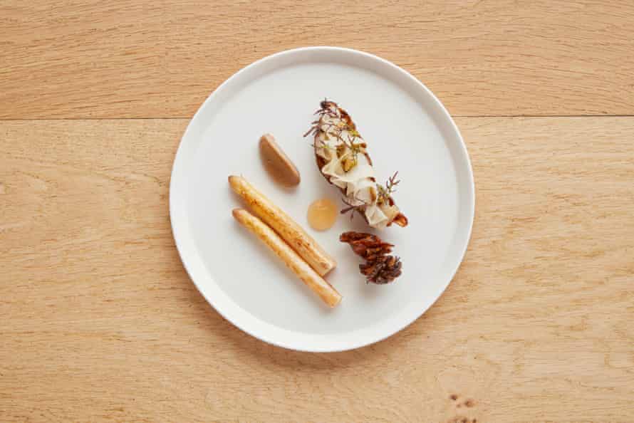 The Barn at Moor Hall’s stuffed roasted jerusalem artichoke with white asparagus pickled pear and hen-of-the- woods.