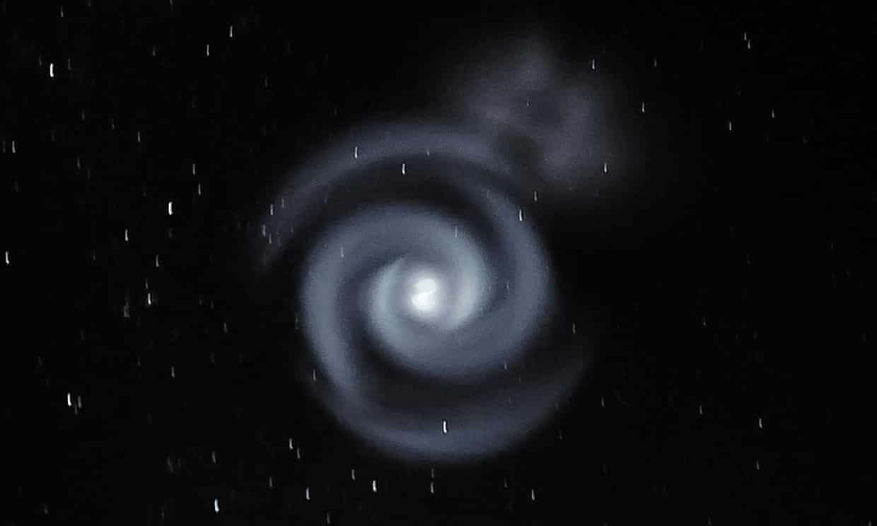 <div class=__reading__mode__extracted__imagecaption>A spiral of blue lights as seen from Stewart Island/Rakiura, New Zealand, on Sunday. Theories on social media about its origins ranged from aliens to foreign rockets to commercial displays. Photograph: Alasdair Burns/Twinkle Dark Sky Tours<br>A spiral of blue lights as seen from Stewart Island/Rakiura, New Zealand, on Sunday. Theories on social media about its origins ranged from aliens to foreign rockets to commercial displays. Photograph: Alasdair Burns/Twinkle Dark Sky Tours</div>