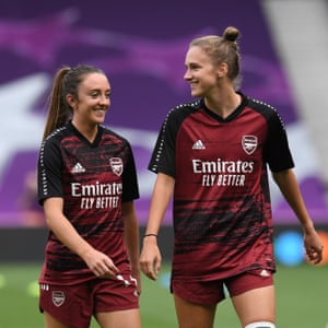 Vivianne Miedema warms up with her partner and teammate Lisa Evans before the Champions League quarter-final against PSG in August.