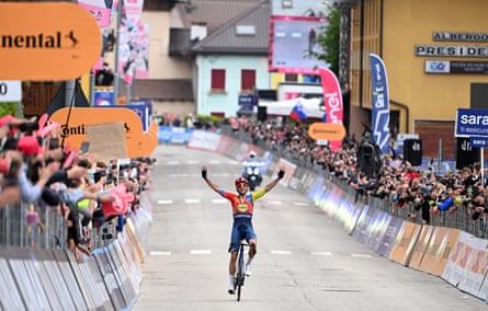 Carlos Verona celebrates as he crosses the line to win stage 15