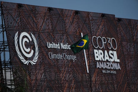 A Brazil flag flies outside the venue for the Cop30 UN climate summit in Belem on Tuesday.