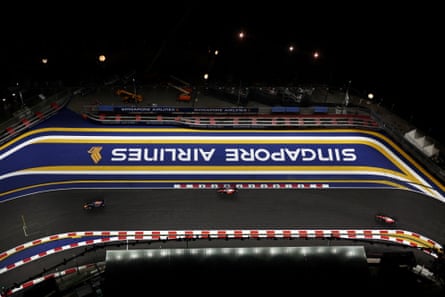 An overhead view of Max Verstappen leading the Ferraris of Charles Leclerc and Lewis Hamilton during the Singapore GP