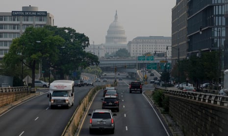 Cars drive in hazy smoke on South Capitol Street towards the U.S. Capitol Building on June 29, 2023 in Washington, DC. The Washington, DC region is under a “Code Red” air quality alert today due to smoke from wildfires burning in Canada.