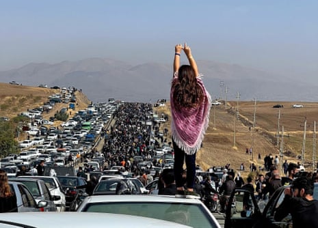 Protesters and mourners gather at the funeral of Mahsa Amini, Iran
