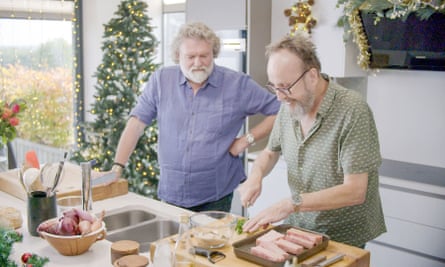 King (left) and Myers prepare a Christmas dish.