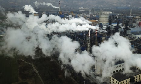 Smoke and steam rise from a coal processing plant in Hejin in central China’s Shanxi province