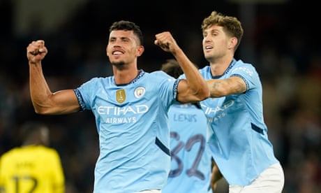 Matheus Nunes celebrates his first-half goal against Watford with teammate John Stones.