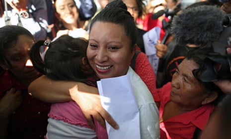 Teodora del Carmen Vásquez hugs her niece as she walks out of jail after her 30-year sentence was commuted.