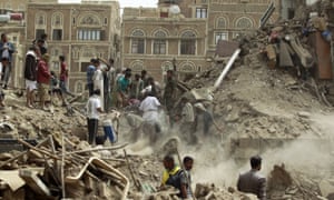 Yemenis searching for survivors under the rubble of houses in the capital Sanaa after a pre-dawn Saudi-led air strike.