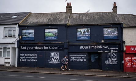 Slogans are seen on buildings next to Roots Hall in Southend.