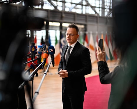 Hungary’s foreign minister Péter Szijjártó speaks to the press as he arrives for the EU Foreign Affairs Council in Brussels, Belgium.