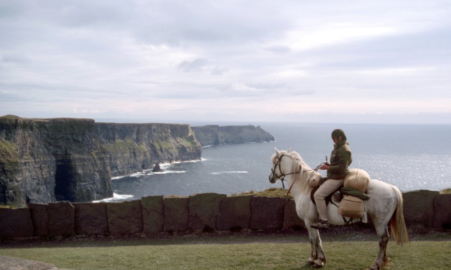 Hilary Bradt on her pony at the Cliffs of Moher, Ireland.