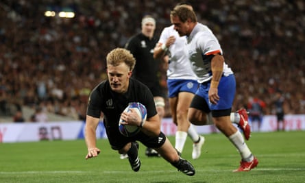 Damian McKenzie dives over for New Zealand’s third try against Namibia