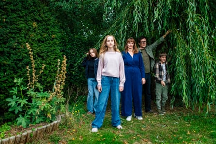 Writer Patrick Barkham with his wife Lisa, twin daughters Milly and Esme, and son Ted, tress behind them
