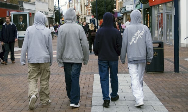 Group of teenage boys wearing hoodies