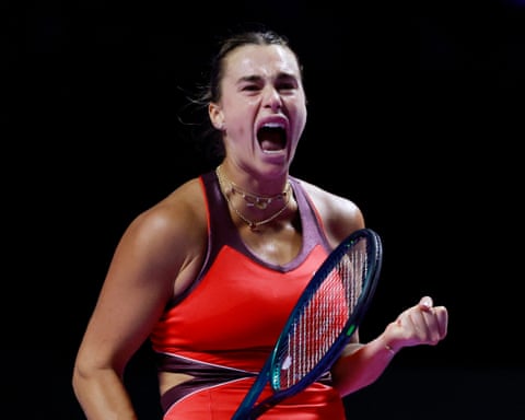 Aryna Sabalenka celebrates after winning the opening set against Coco Gauff.