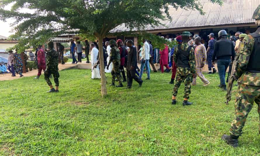 Security forces guard Ondo’s governor as he visits the church attack site