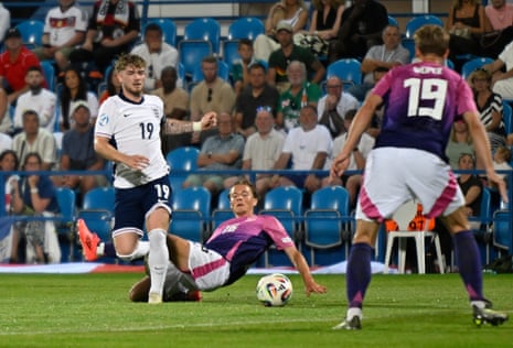 Harvey Elliott evades the sliding Caspar Jander.