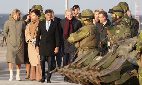 Britain's Prime Minister Rishi Sunak, third left, joins other political leaders to view military equipment that has been given to Ukraine, ahead of the Joint Expeditionary Summit (JEF) on the Baltic island of Gotland, Sweden.