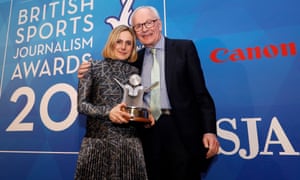Marina Hyde receives the SJA sports writer of the year award from Patrick Collins – her second award of the night.