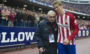 Atletico Madrid’s Fernando Torres celebrates with Manuel Briñas, the man who discovered him as a 10-year-old.