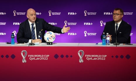 Giannin Infantino (left) delivers his rambling monologue flanked by Fifa’s head of media relations Bryan Swanson.
