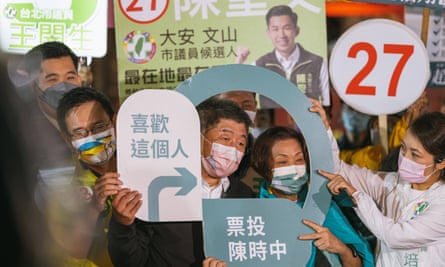 DPP candidate for Taipei city mayor Chen Shih-chung meets supporters at a campaign event.