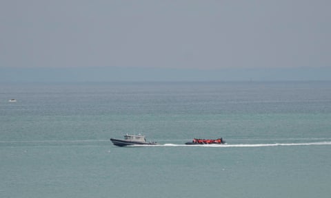 French officials escorting a vessel earlier this month.