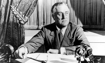 President Franklin D Roosevelt delivers his first radio ‘fireside chat’ in 1933. Biden sees parallels today with the situation facing Roosevelt, whose New Deal was instrumental in pulling the US out of the Great Depression.