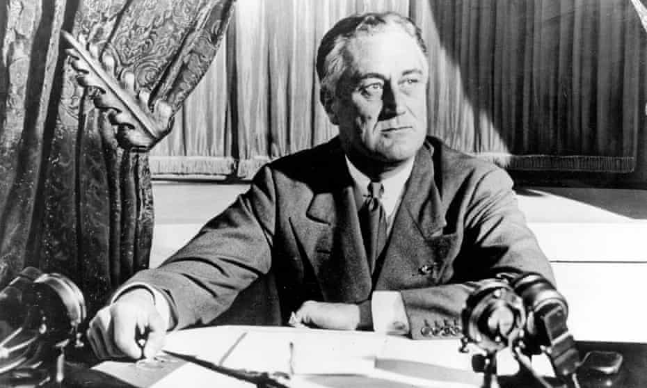 President Franklin D Roosevelt delivers his first radio ‘fireside chat’ in 1933. Biden sees parallels today with the situation facing Roosevelt, whose New Deal was instrumental in pulling the US out of the Great Depression.