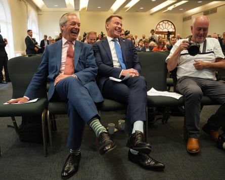 Farage laughing at an event