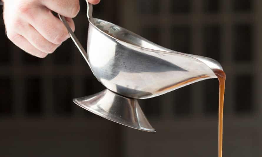 Gravy poured from silver boat