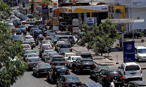 Vehicles queue-up for fuel at a petrol station in Lebanon’s capital, Beirut
