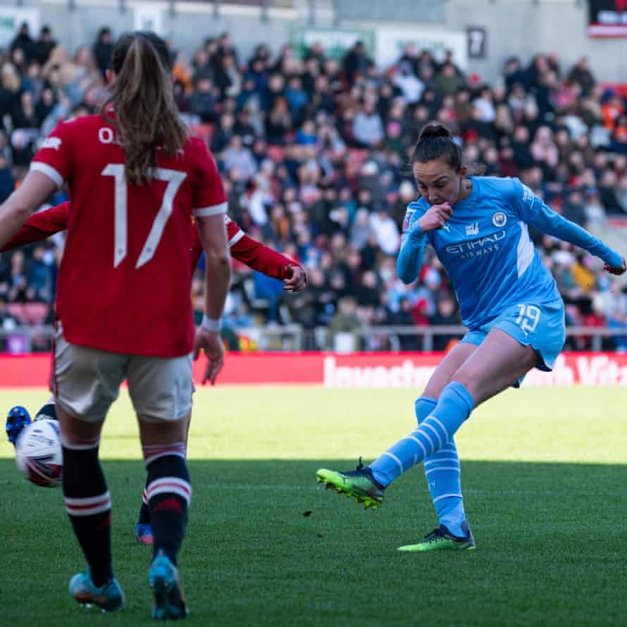 Manchester City's Caroline Weir scores her team's third goal.