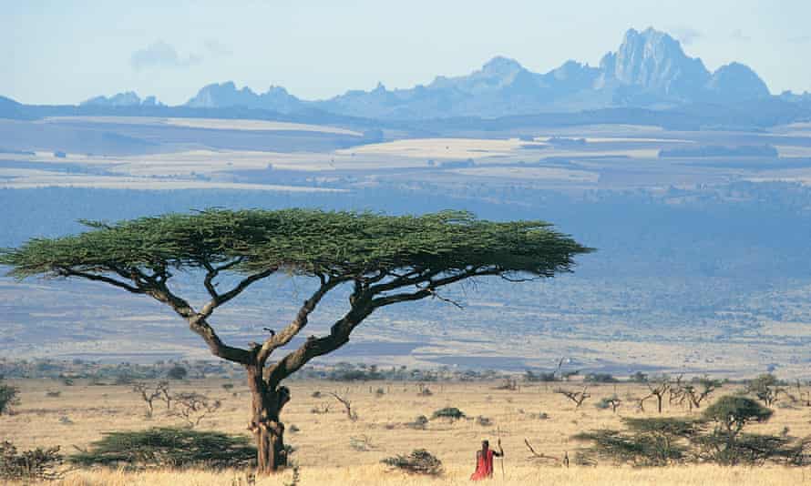 Beautiful country: a Maasai warrior gazes towards Mount Kenya across Laikipia Plain.