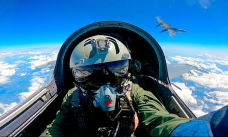 A fighter jet pilot of the Chinese People's Liberation Army takes part in combat readiness patrol and military exercises around Taiwan on 9 April 2023.
