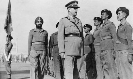 Gen Sir Roy Bucher inspects a guard of honour in India after relinquishing his post in January 1949