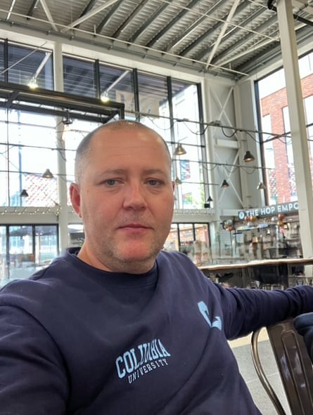 Close up of Phil Pennington in a blue sweatshirt