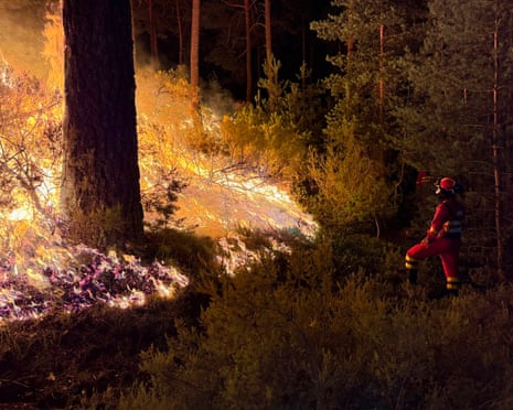 Members of Spain’s Military Emergencies Unit fighting a wildfire in La Mierla area, near Guadalajara, about 100 kilometers north of Madrid.