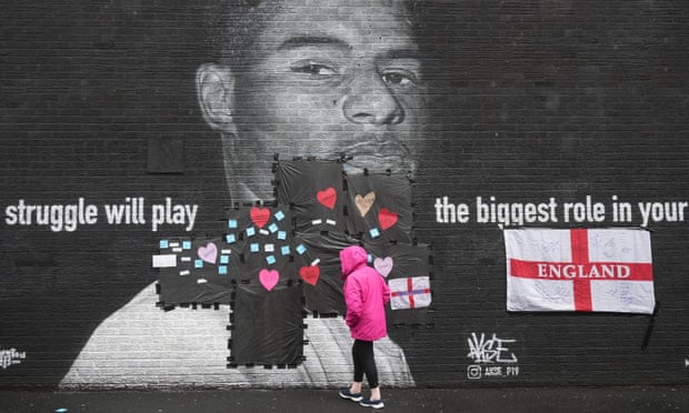 A mural of the England forward Marcus Rashford was defaced in Manchester.