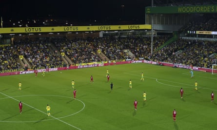 Norwich line up with a three-man defence against Liverpool in midweek